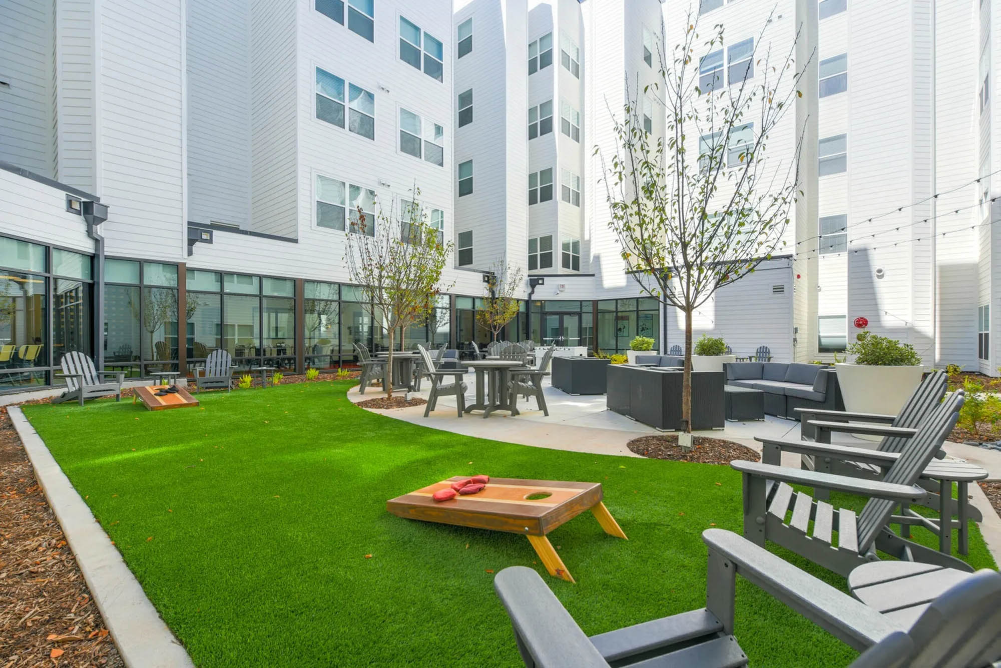 Cornhole in courtyard